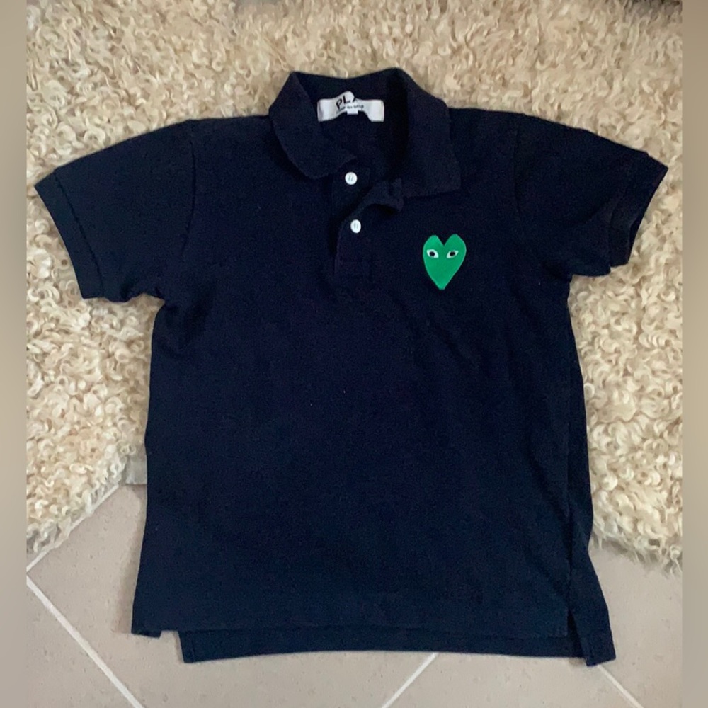 CDG navy polo with green heart patch size xs
